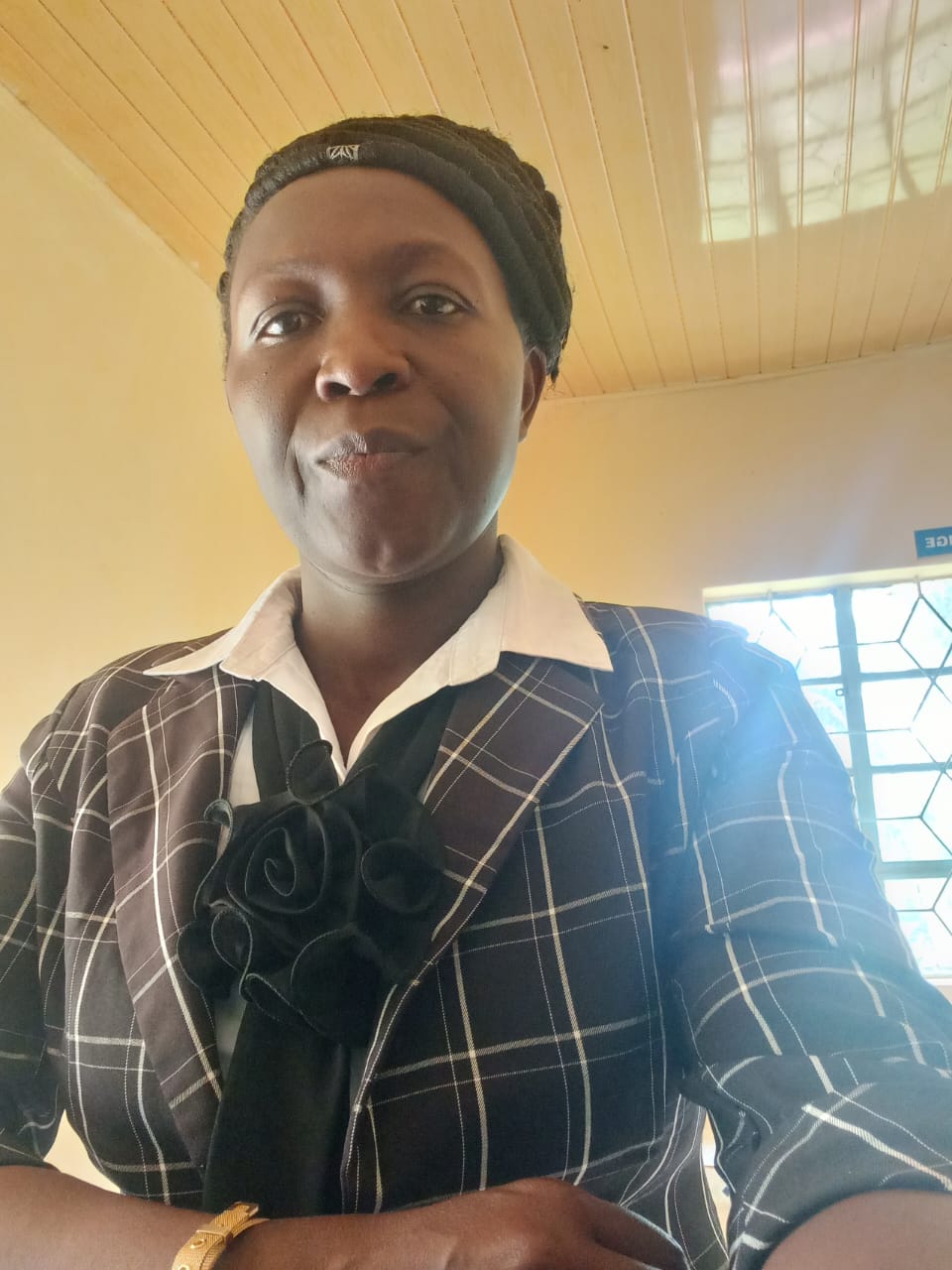 Ms. Elizabeth Burudi